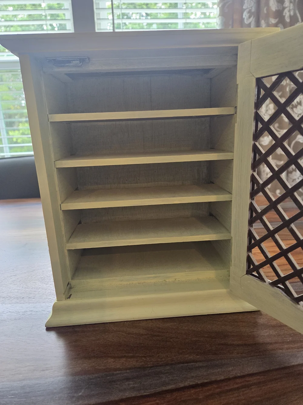 Distressed Pale Yellow Wood Cabinet with Lattice Door - Home Storage